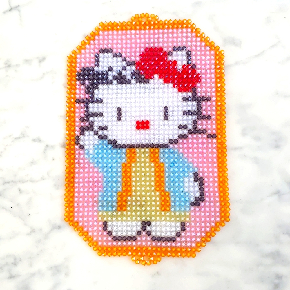 Brand new, Handmade Hello Kitty by Crystal beads.